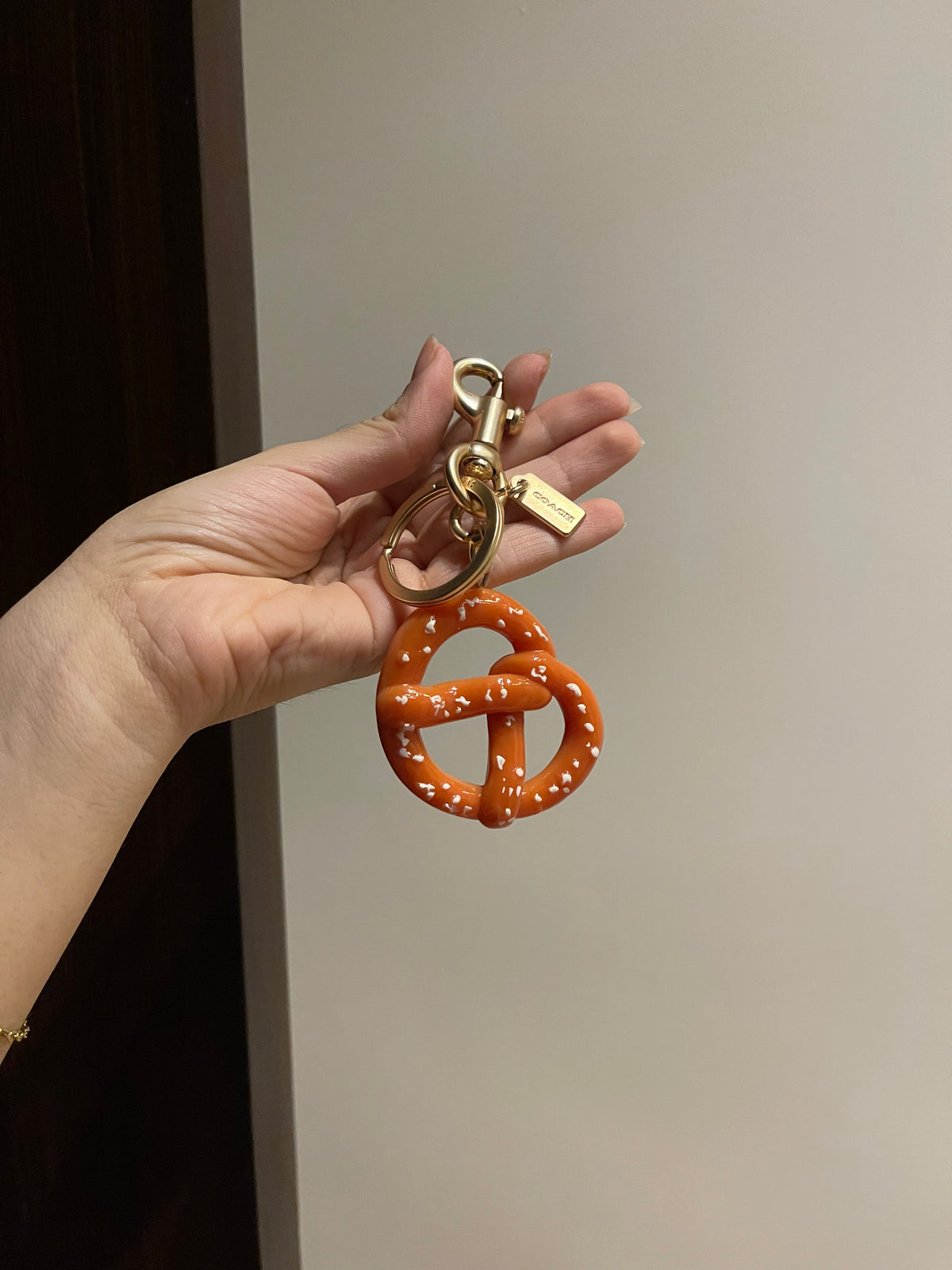 ‘Pumpkin Spice Pretzel’ Bag Charm