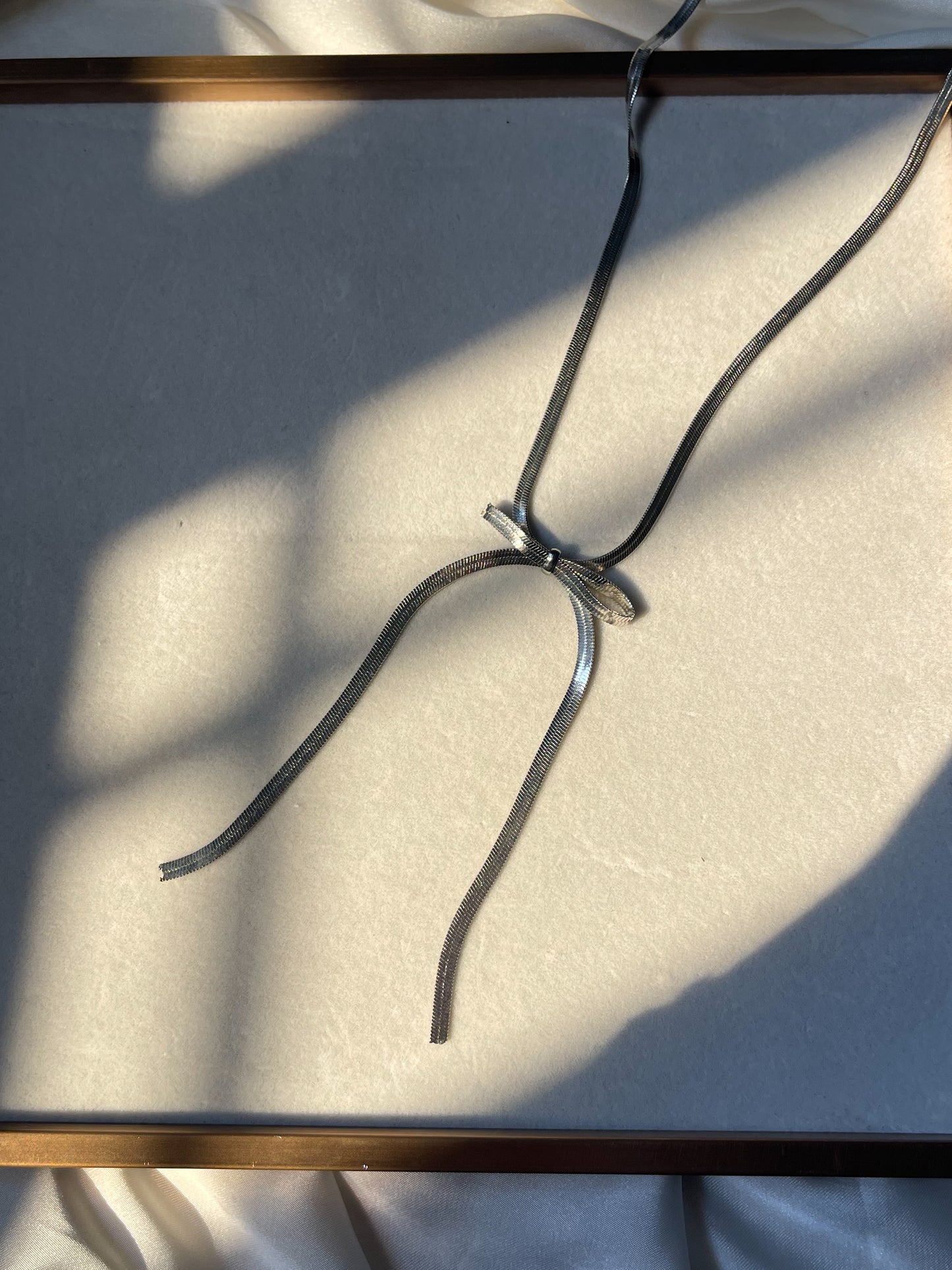 Silver Bow Statement Necklace